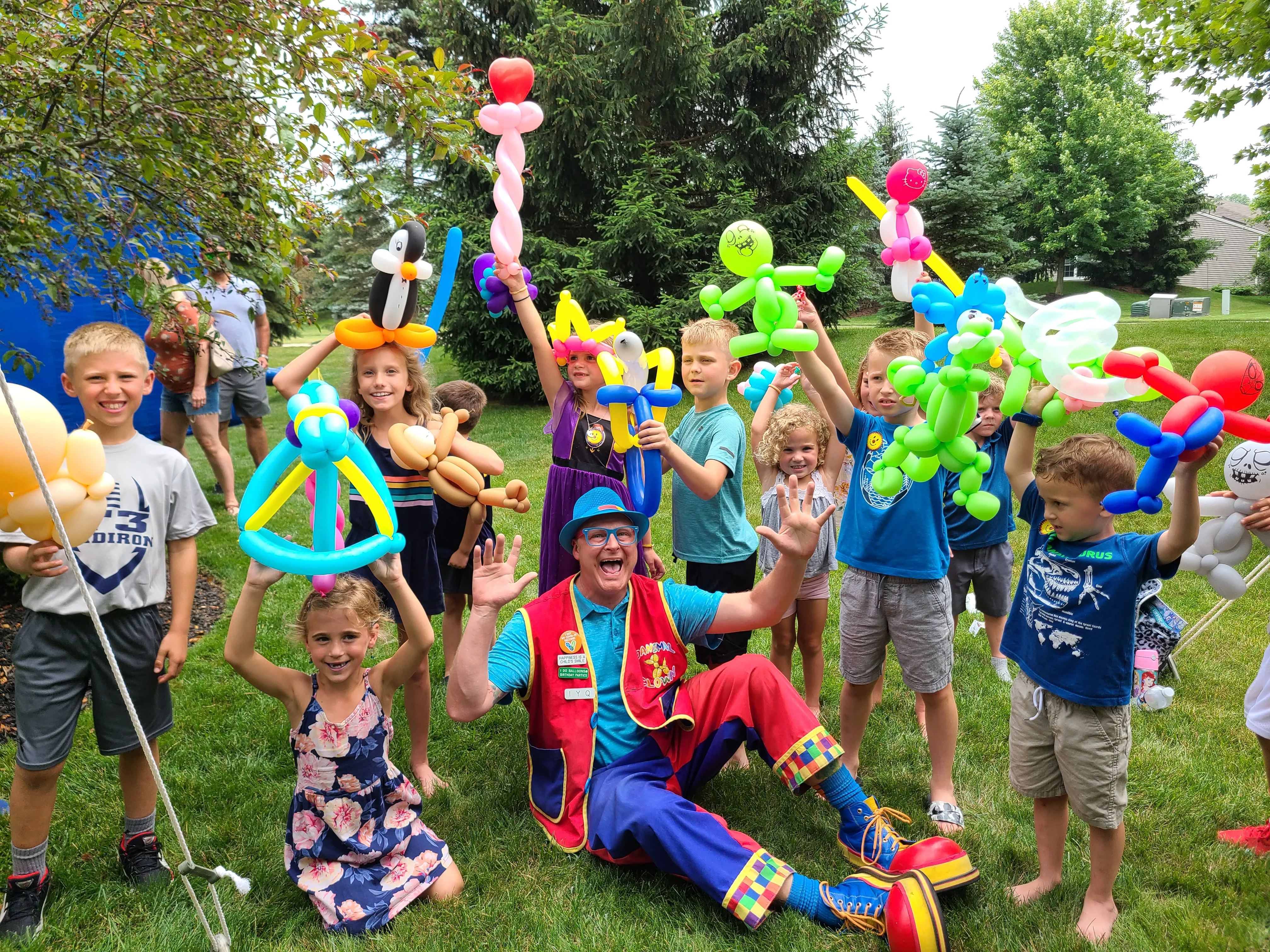 Danimal with a group at a community event